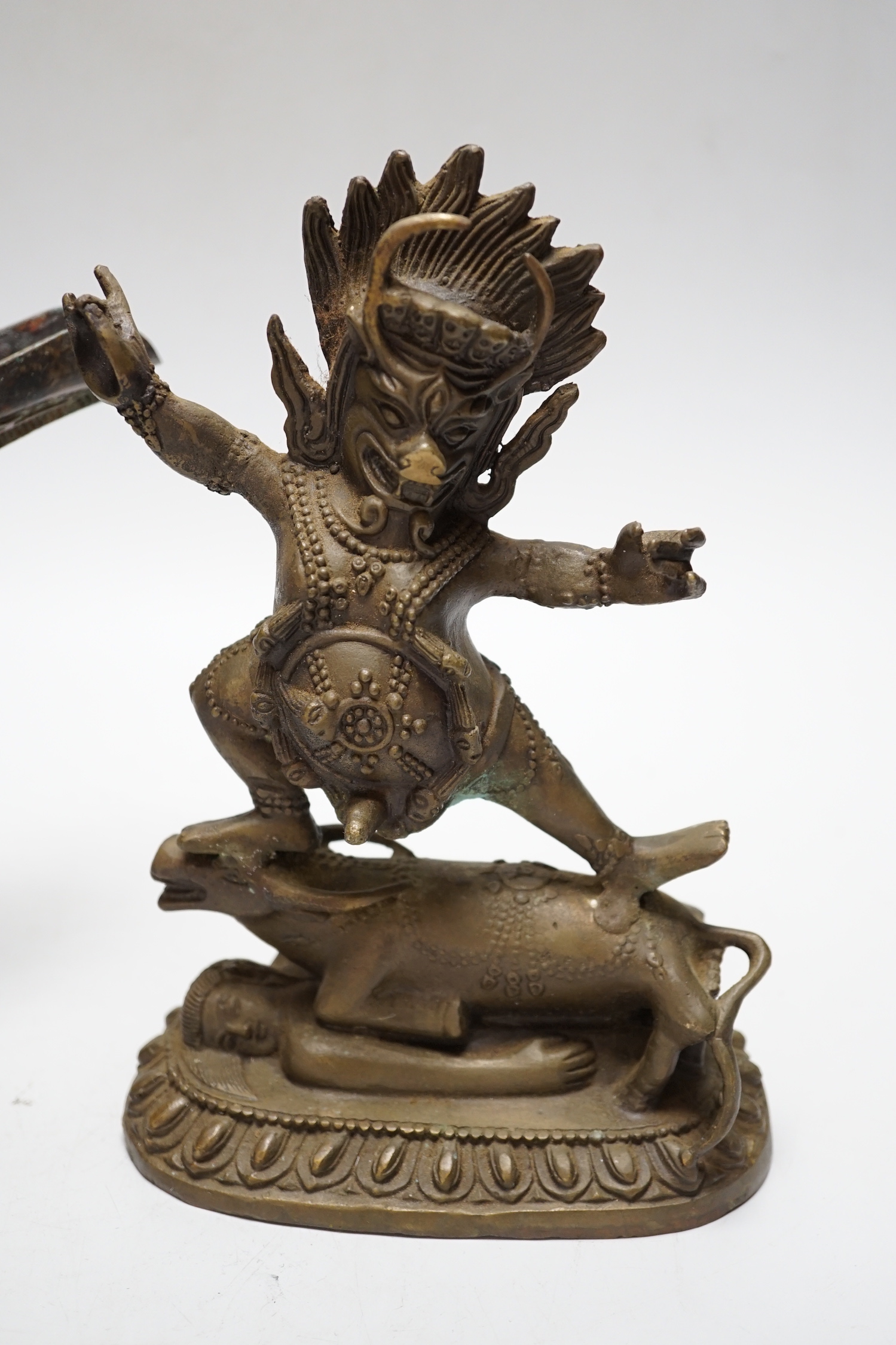 A Buddhist bronze figure and a bronze yi vessel, figure 22cm high